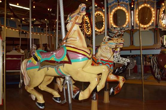 A close up of a carousel

Description automatically generated