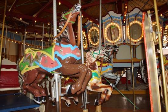 A close up of a carousel

Description automatically generated