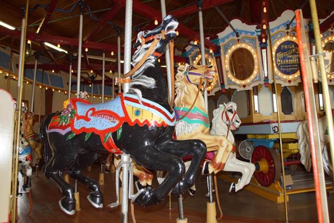A close up of a carousel

Description automatically generated
