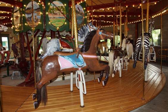 A close up of a carousel

Description automatically generated