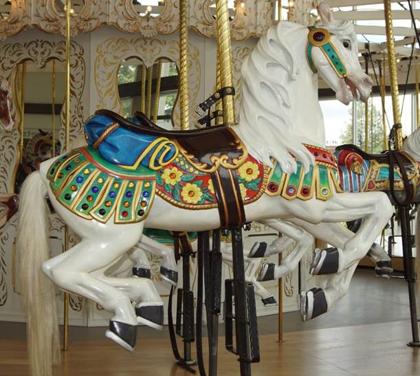 A chair sitting in front of a carousel

Description automatically generated