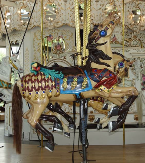 A close up of a carousel

Description automatically generated